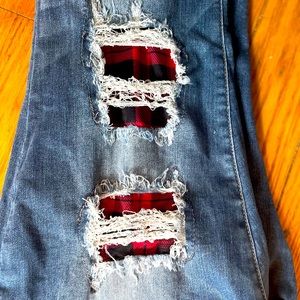 Judy Blue Jeans size 16W! With black and red plaid underneath.